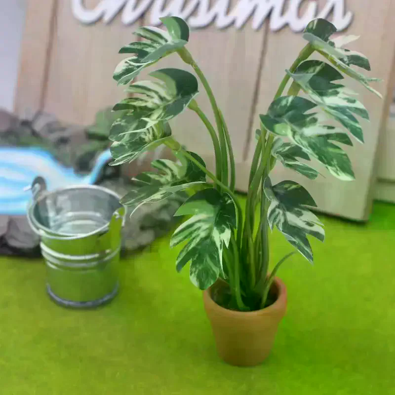 Bonsai Garden Europe - 1/12 Puppenhaus-Dekorationsmodell Simulierte Monstera-Grünpflanze im Topf